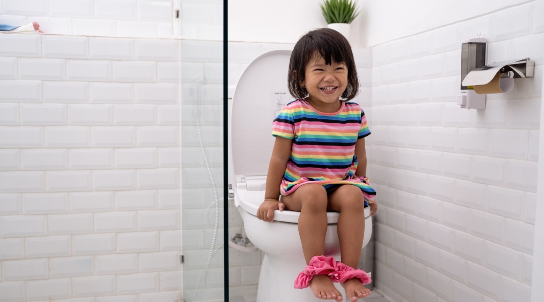 potty training toddler litle girl sitting