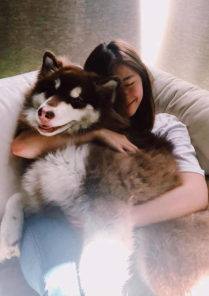 Female celebrity and her pet dog
