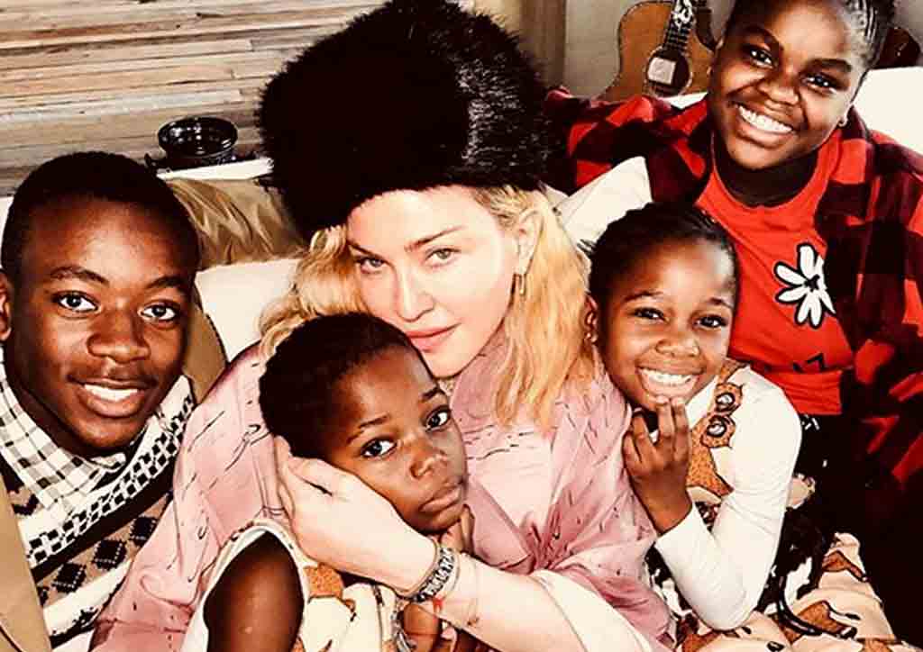 Madonna posing with children 