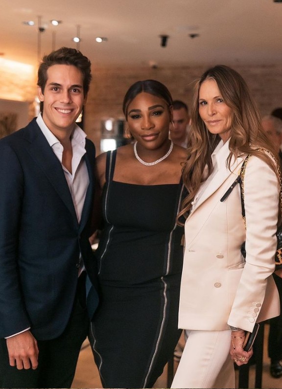 Serena Williams wearing a black dress with silver embellishments