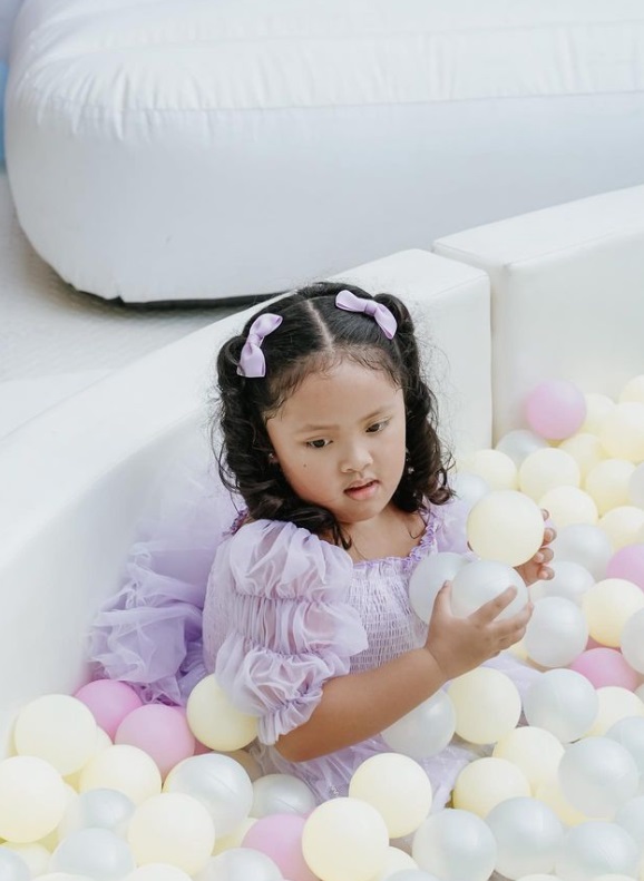 tali sotto in a ball pit