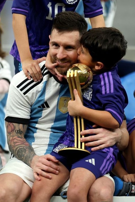 Lionel Messi and his son