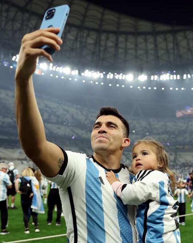 Argentina National Football Team's Left Back Marcos Acuña takes a selfie with his Daughter