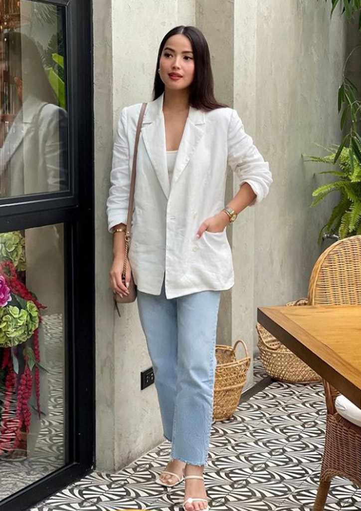 Maoui David in a casual look featuring a white blazer.