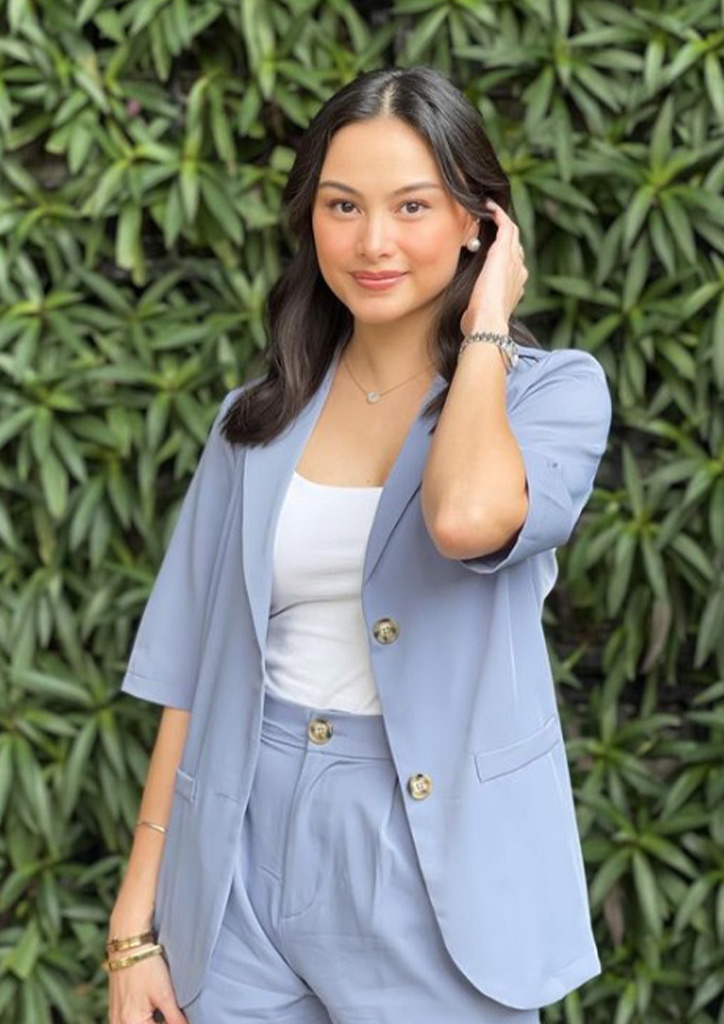 Vanna Garcia in a periwinkle blazer.