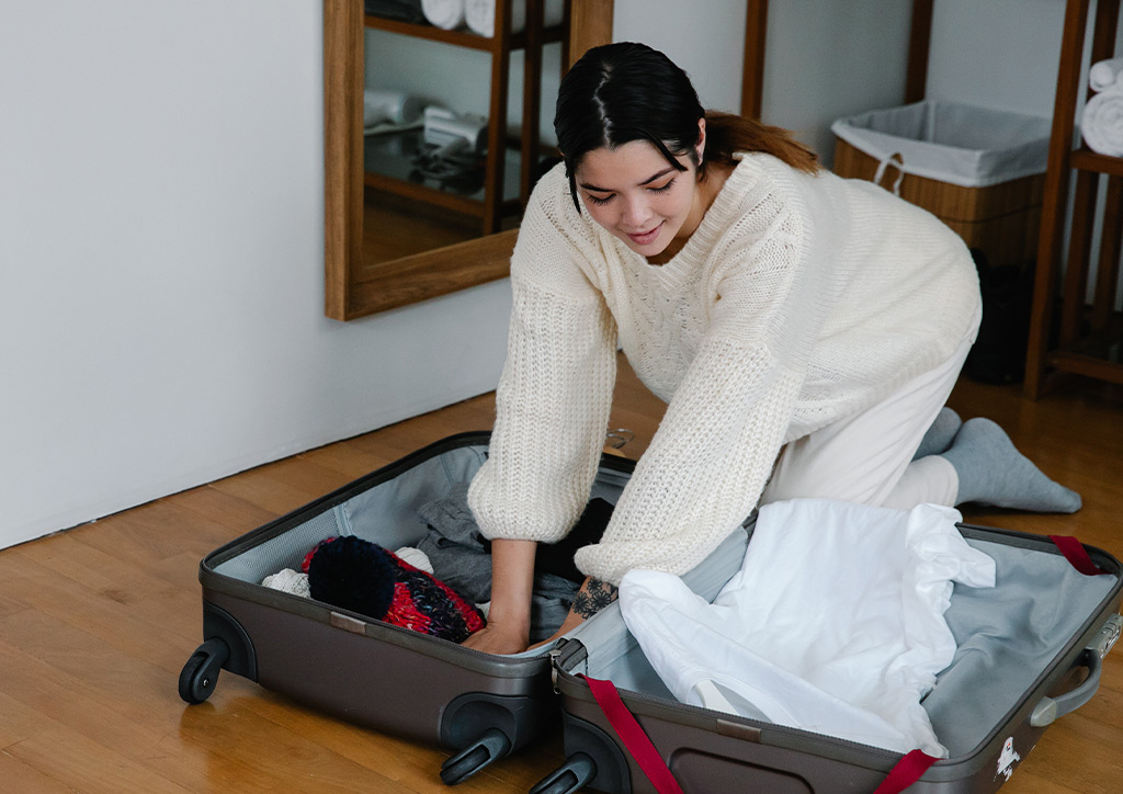 A Filipino student packing her bag and getting ready to migrate.