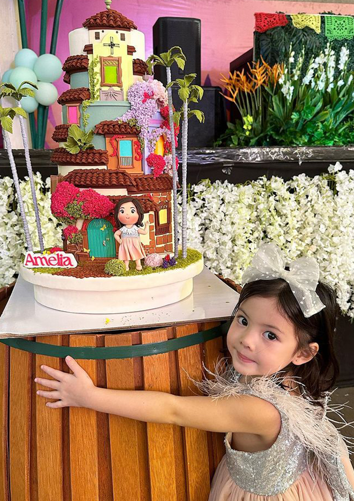 Amelia Manzano Reyes with her Encanto-themed birthday cake