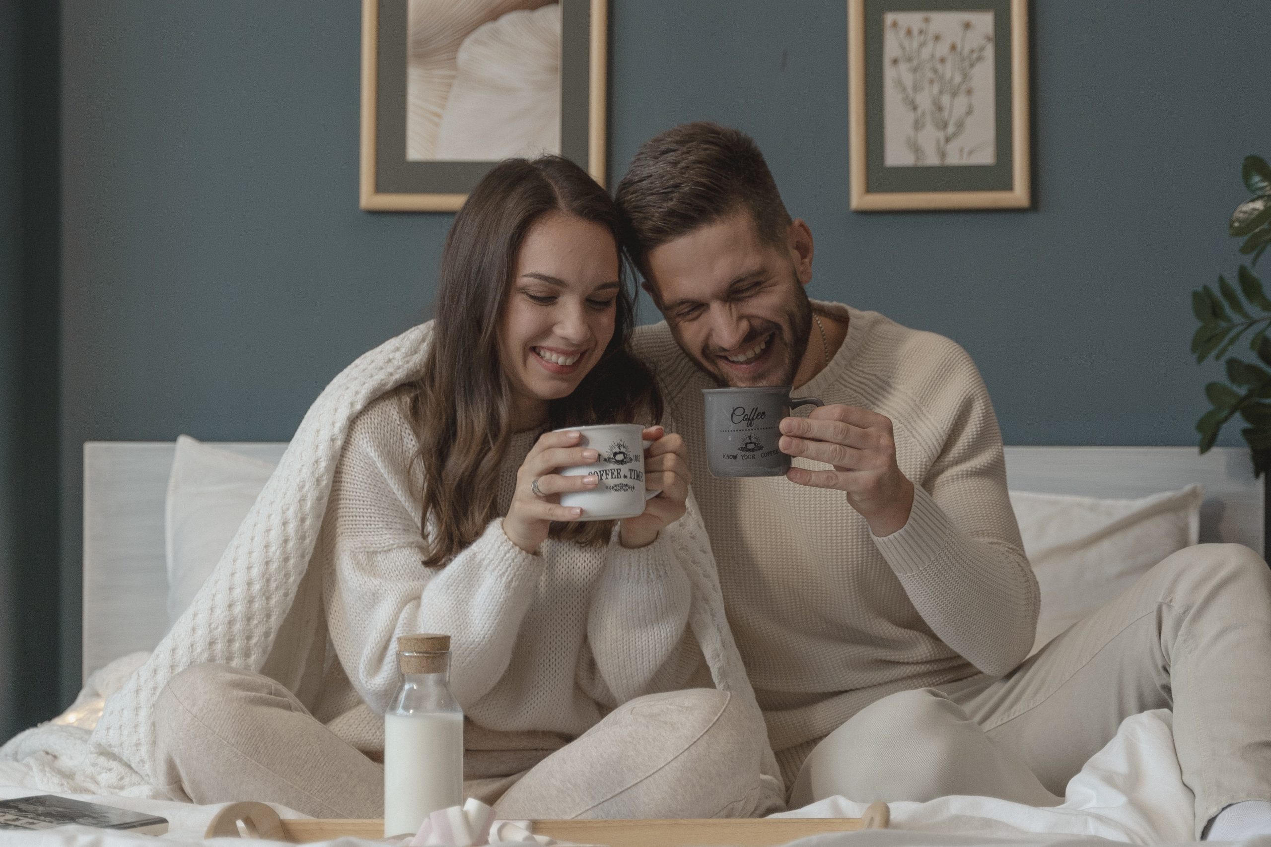 A wife and husband enjoying coffee together