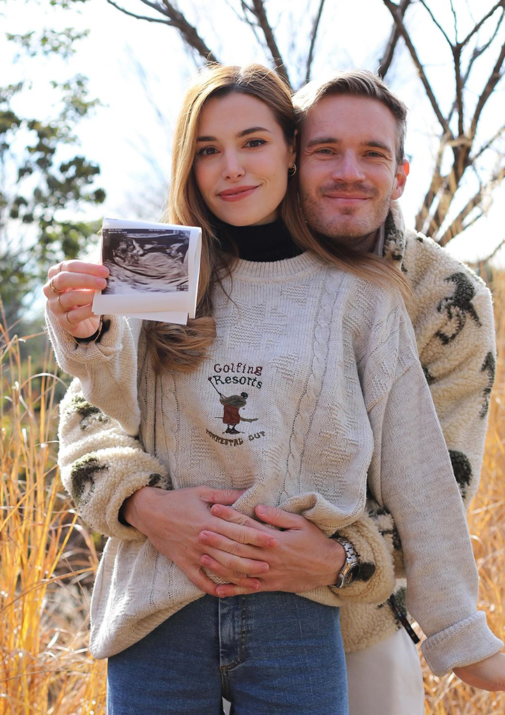 PewDiePie and Marzia with a sonogram photo of their baby