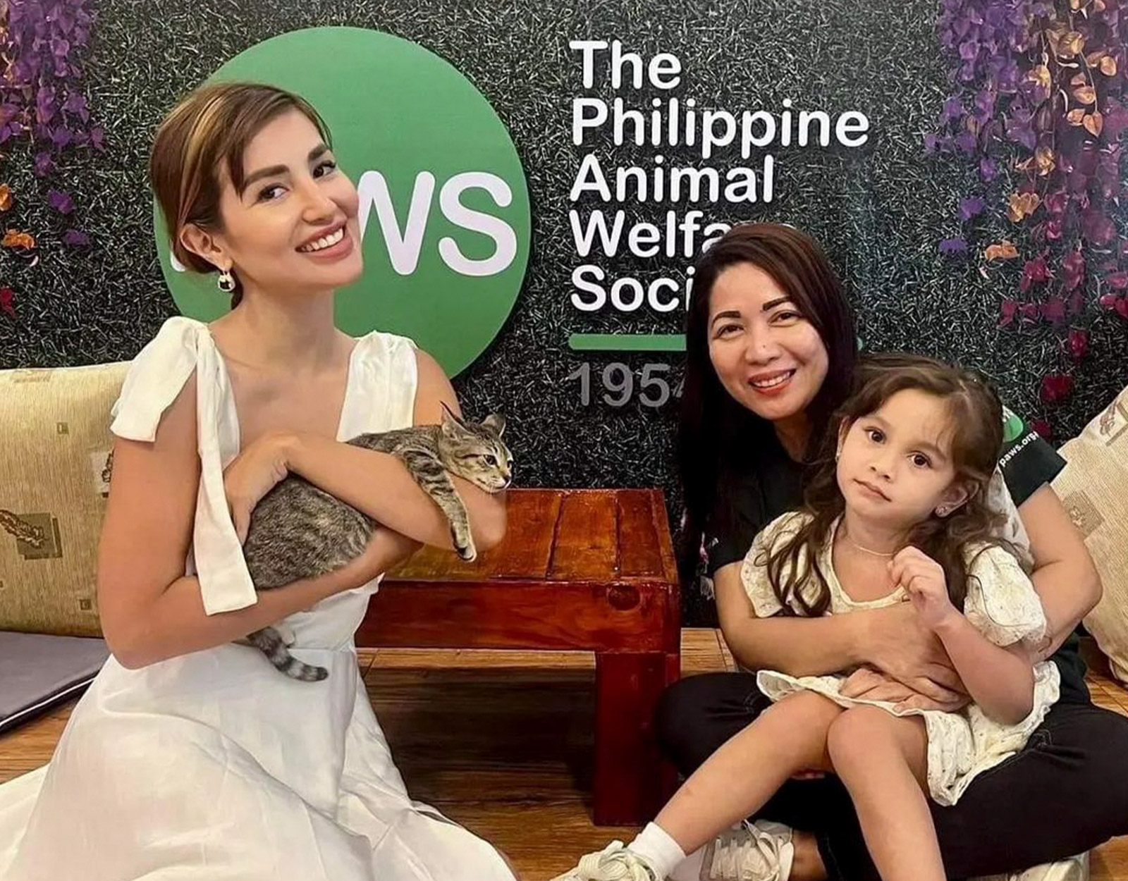 Nathalie Hart carrying a cat