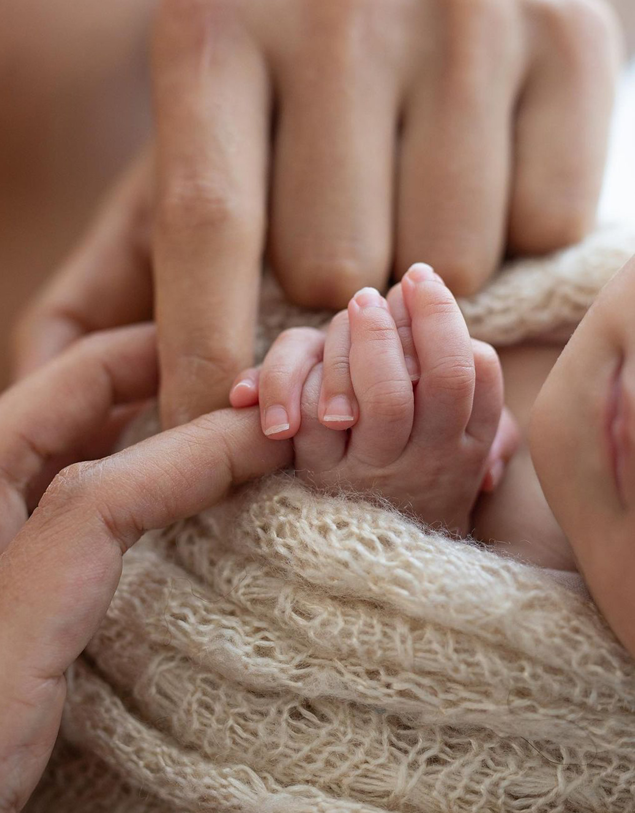 Iza Calzado holding her daughter's hand