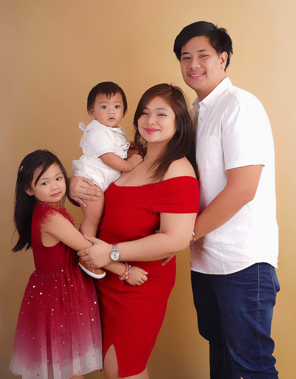 Arramaine Serrano, also known as Kitty, with her family