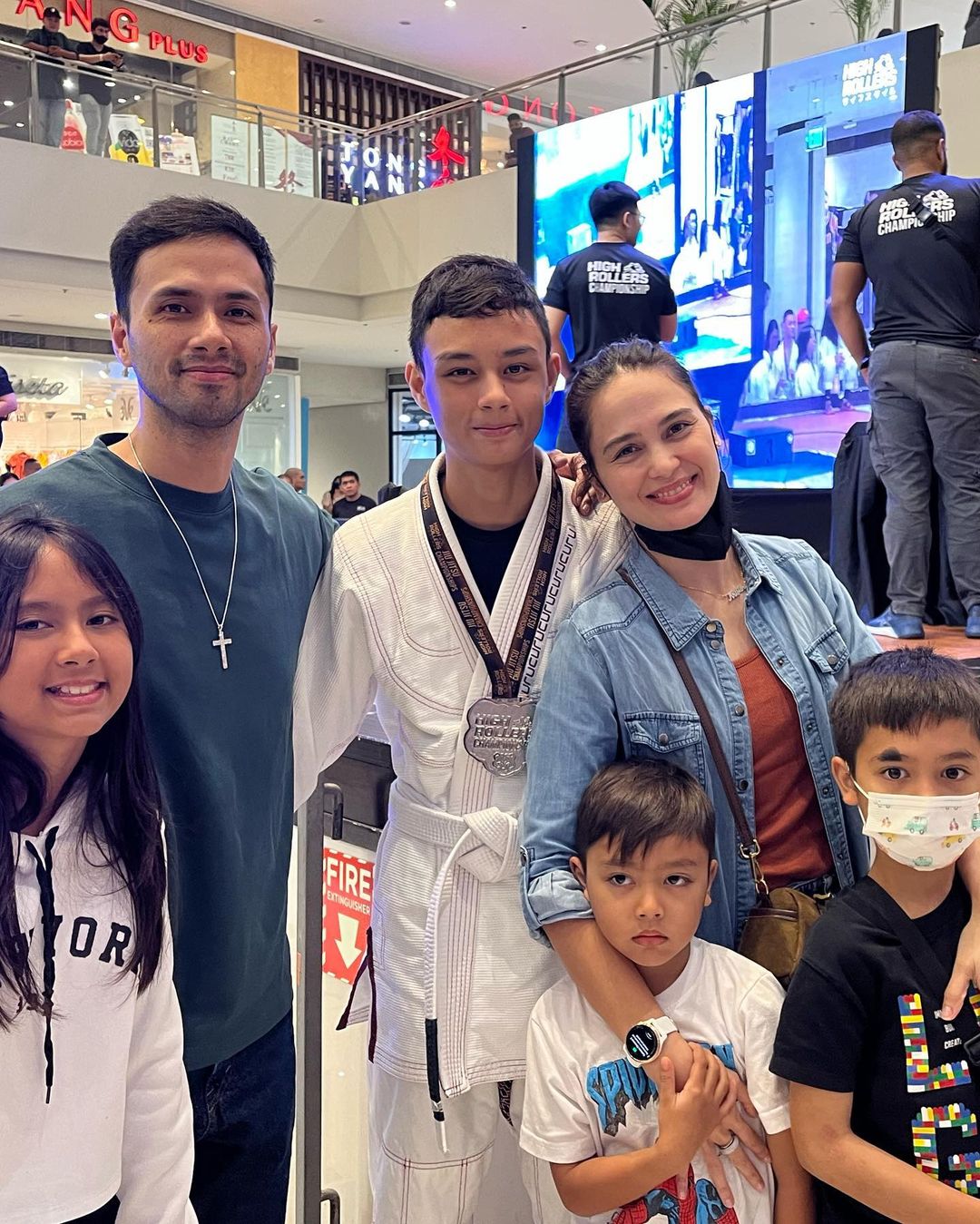 Celebrity parents Oyo Boy Sotto and Kristine Hermosa pose with their eldest, Kiel, has he wins a medal in his sport of choice: jiujitsu.